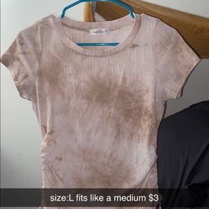 shirt that has strings on the side that can make it a crop top